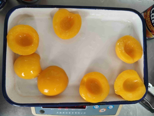 Pêssegos amarelos convenientes em lata com 1800g de peso drenado
