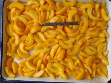 Doce regular pêssego amarelo enlatado no açúcar no sangue e em lipidos claros do xarope mais baixo