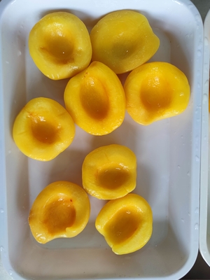 Pêssegos amarelos enlatados de grau A perfeitos para as necessidades do seu negócio