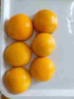 Deliciosos Pêssegos Amarelos em Conserva para Amantes de Frutas Sirva Gelado ou em Temperatura Ambiente